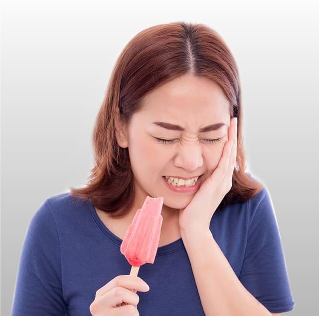 chữa ê buốt răng